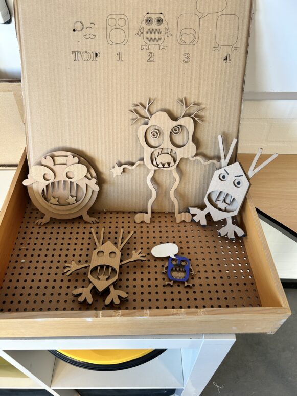 Eksempler på små trolde eller monstre lavet på lasercutter