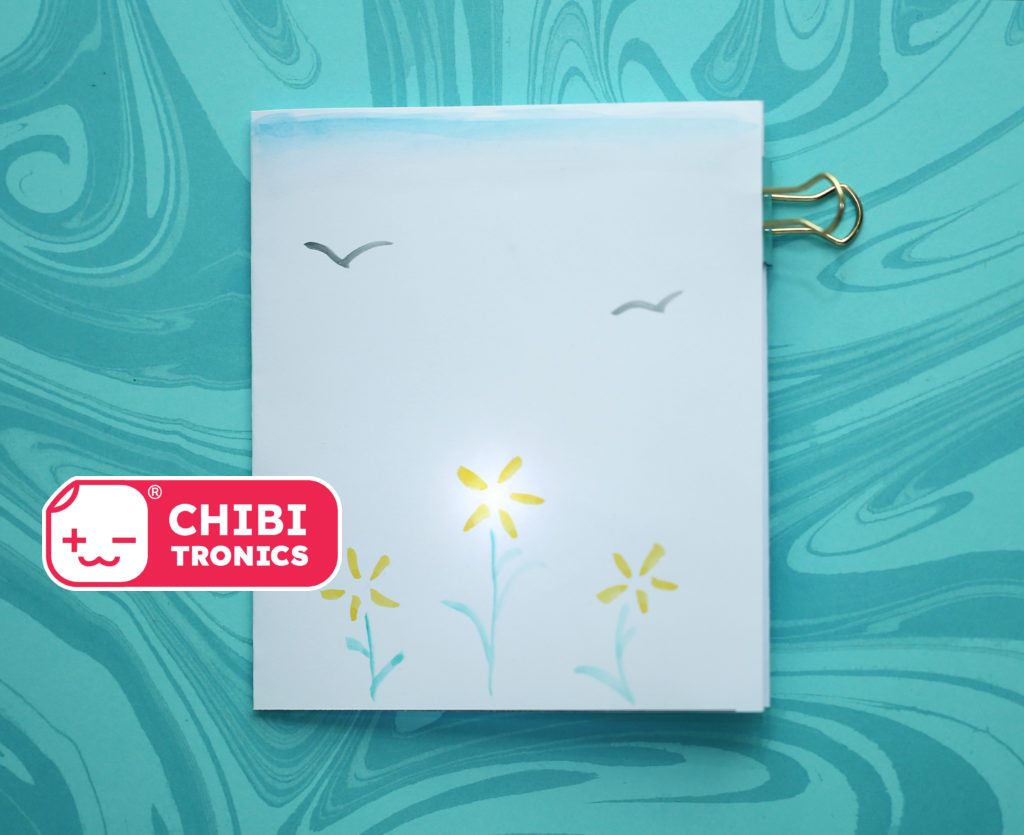 Dekorativt postkort med lys i.